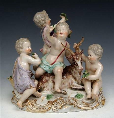 Appraisal: A MEISSEN PORCELAIN MODEL OF FOUR PUTTI AND GOAT on