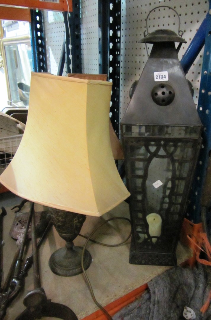 Appraisal: A pair of spelter table lamps a stainless steel fire