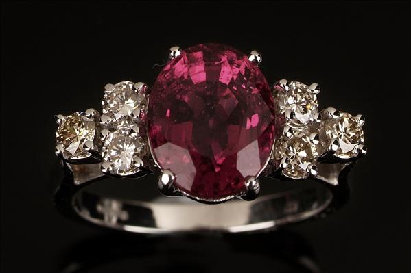 Appraisal: A pink tourmaline and diamond ring the central oval mixed