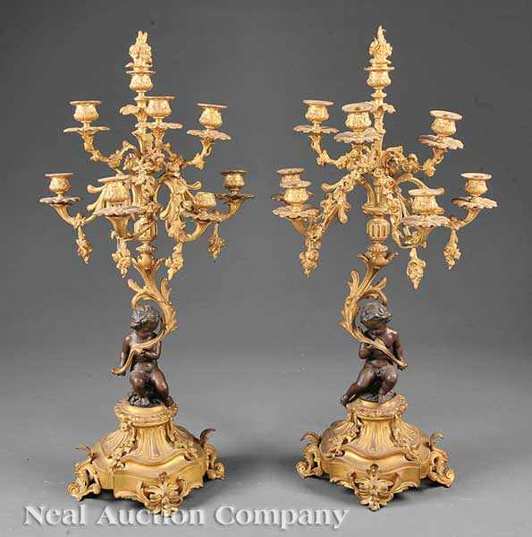 Appraisal: A Pair of Louis XVI-Style Gilt and Patinated Bronze Eight-Light