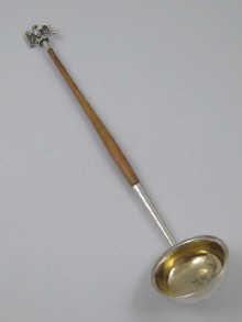 Appraisal: A Scottish crested silver Toddy Ladle with eagle finial Glasgow