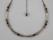 Appraisal: A white metal tests silver necklace set with blue stones