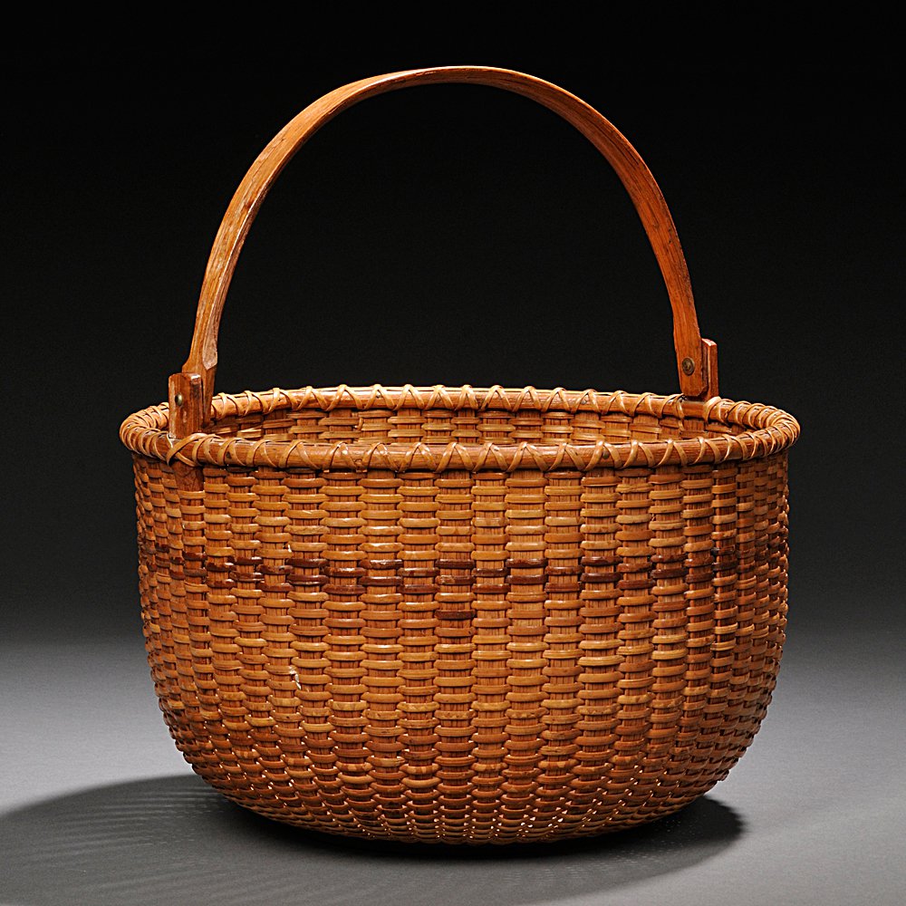 Appraisal: Large Deep Round Swing-handled Nantucket Basket early th century with