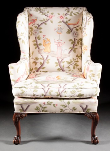 Appraisal: Chippendale style mahogany upholstered wing chair th century with ball