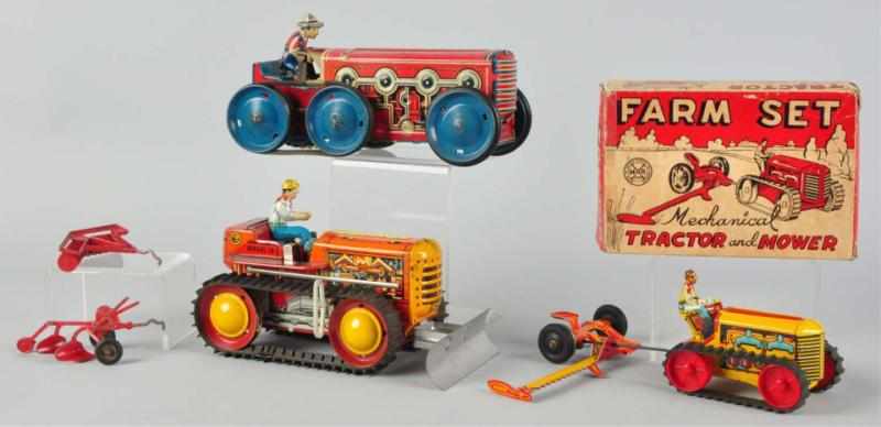 Appraisal: Lot of Tin Litho Marx Tractor Wind-Up Toys American Working