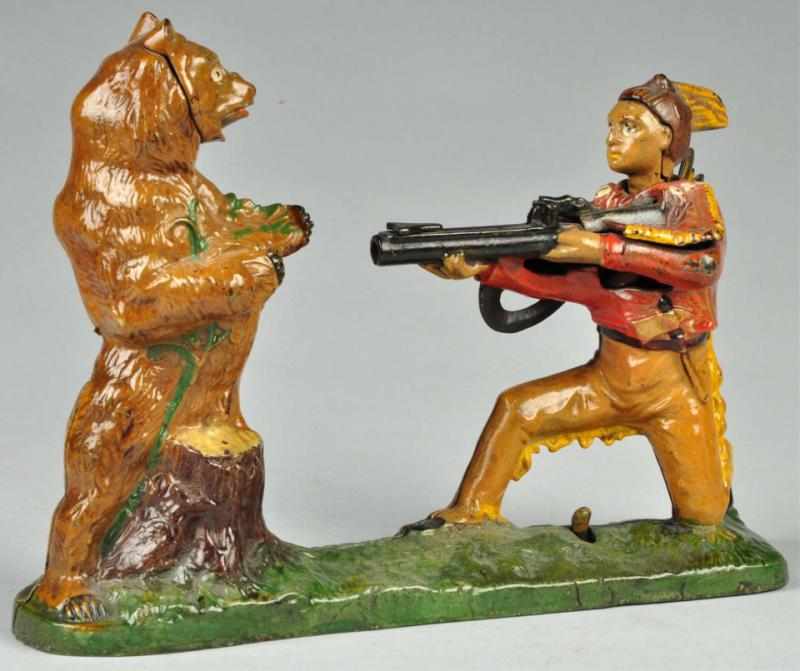 Appraisal: Cast Iron Indian Bear Mechanical Bank Description Working Manufactured by