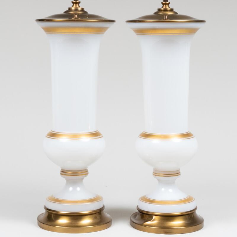 Appraisal: Pair of Gilt Banded Milk Glass Urns Mounted as Lamps