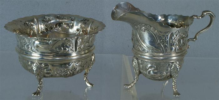 Appraisal: English repousse silver creamer and sugar Chester c - tall