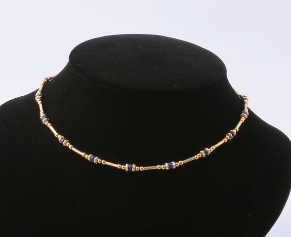 Appraisal: KY Long beaded necklace accented with Lapis Lazuli beads gms