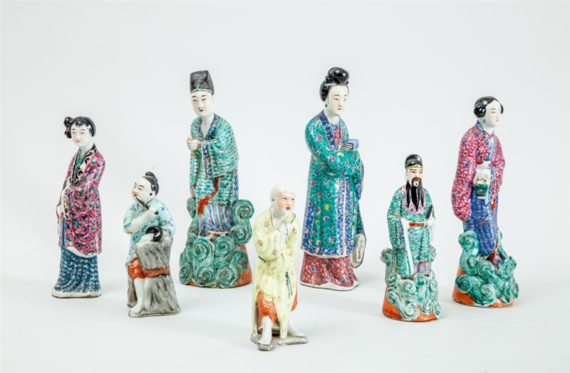 Appraisal: GROUP OF SEVEN CHINESE PORCELAIN FIGURES The three largest impressed