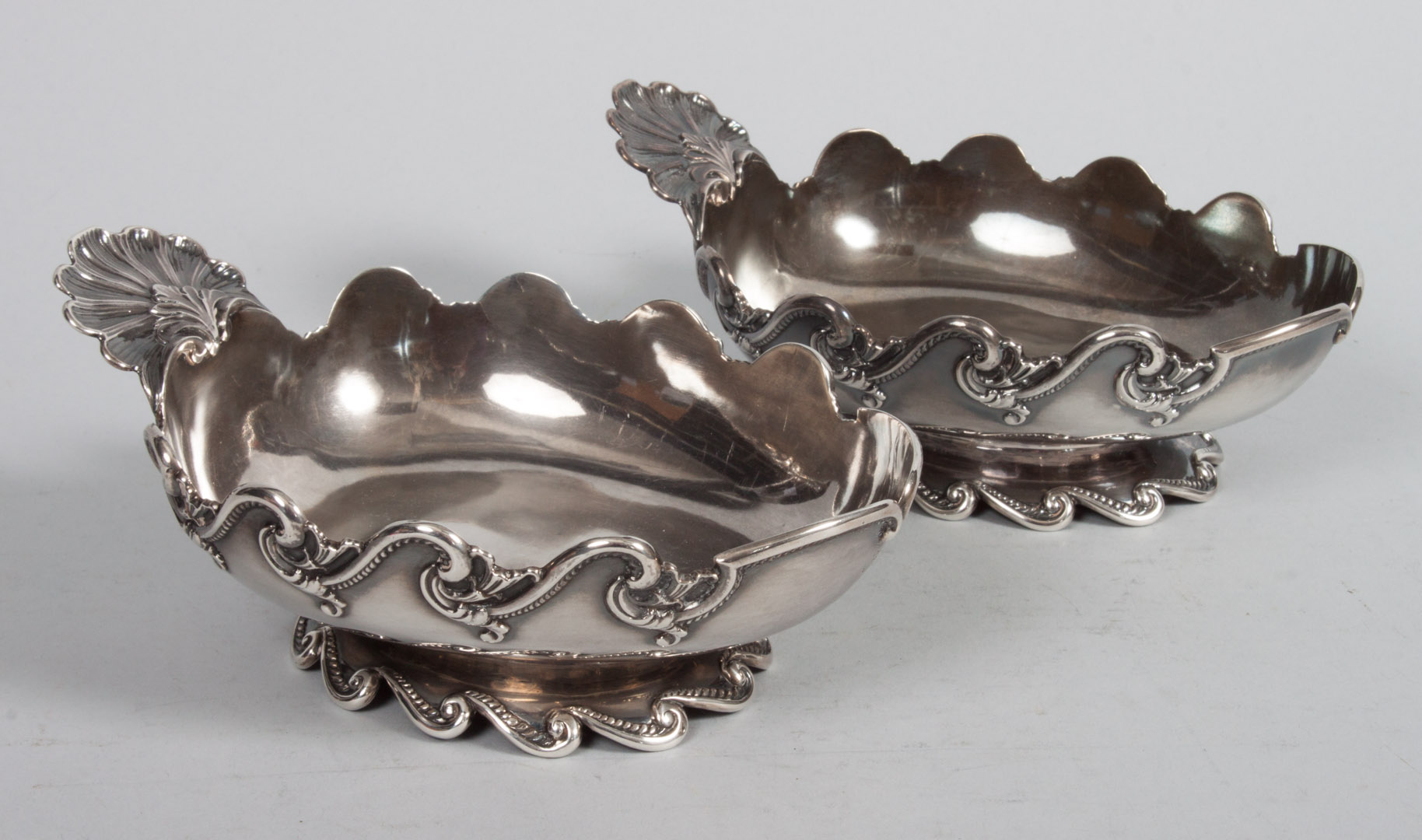 Appraisal: Pair of English sterling leaf-form nut dishes James Garrard retailed