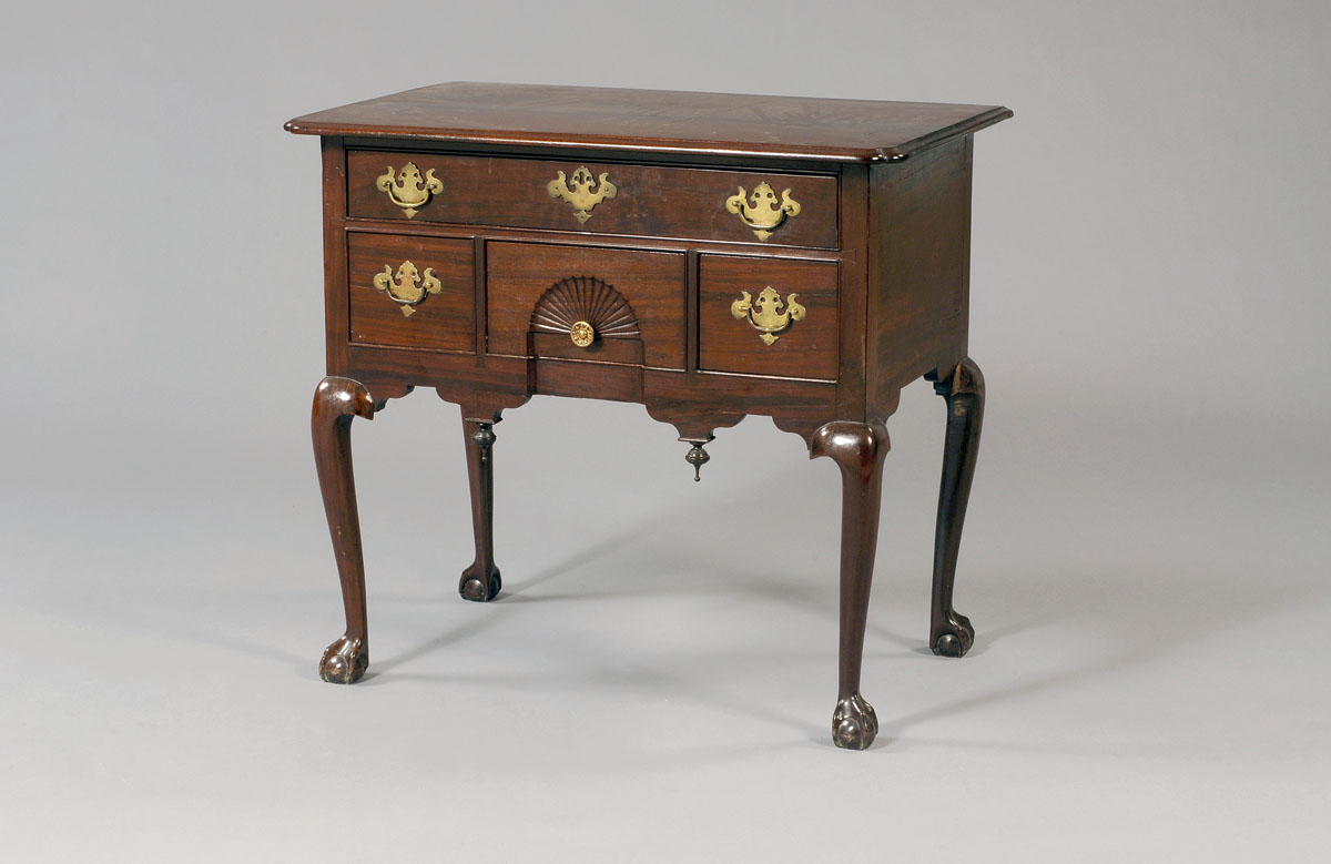 Appraisal: NEW ENGLAND CHIPPENDALE CARVED MAHOGANY LOWBOY The rectangular top with