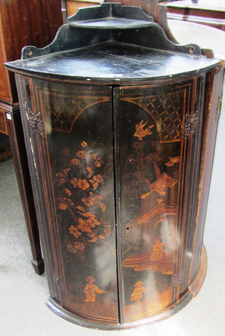 Appraisal: A th century black lacquer and chinoiserie decorated bowfront two