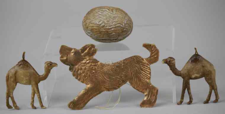 Appraisal: TWO DRESDEN CAMELS WALNUT AND DOG ORNAMENTS Germany two small