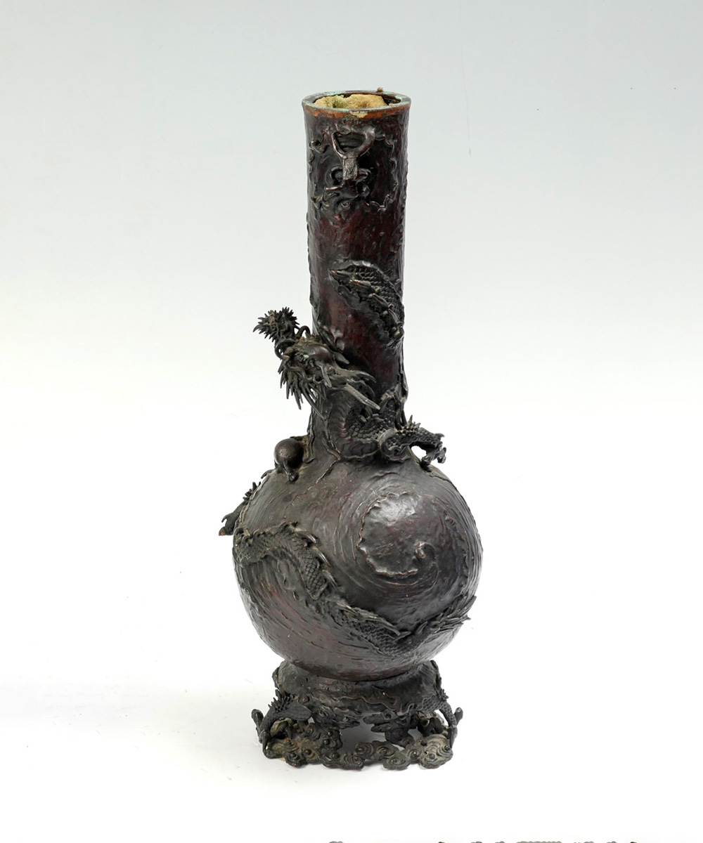 Appraisal: HIGH RELIEF JAPANESE BRONZE DRAGON VASE Sculpted tall bronze bottle