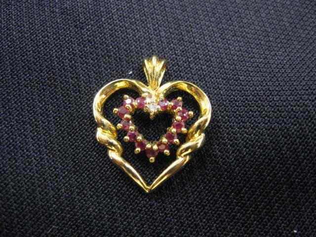 Appraisal: Ruby Diamond Heart Pendant rubies and diamond in k yellow