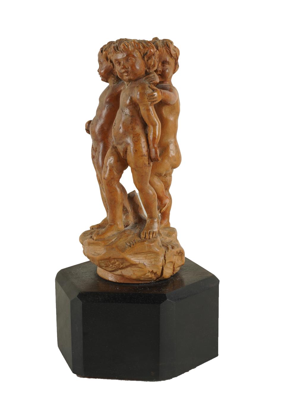 Appraisal: CONTINENTAL CARVED WOOD FIGURAL GROUPunsigned mounted to a later stained