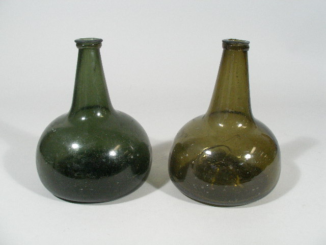 Appraisal: Two Antique Black Glass Onion Bottles late th - early