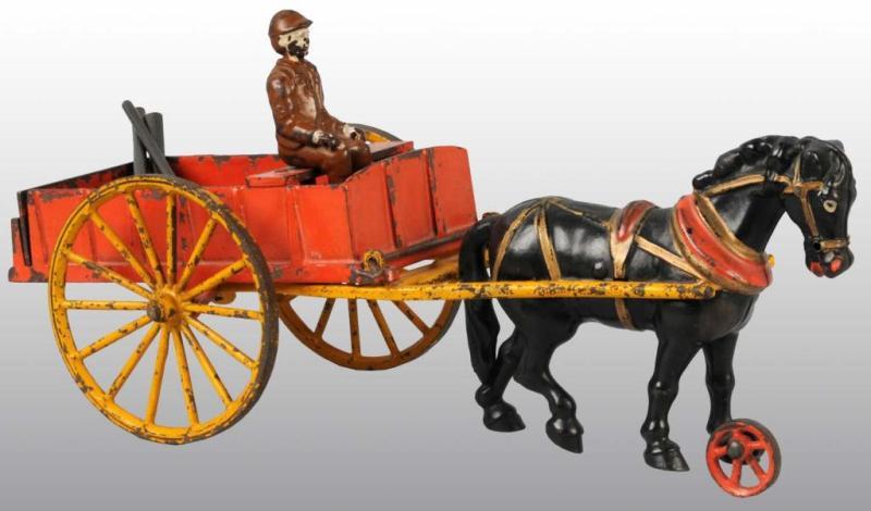 Appraisal: Cast Iron Hubley Horse-Drawn Dump Cart Toy Description Orange and