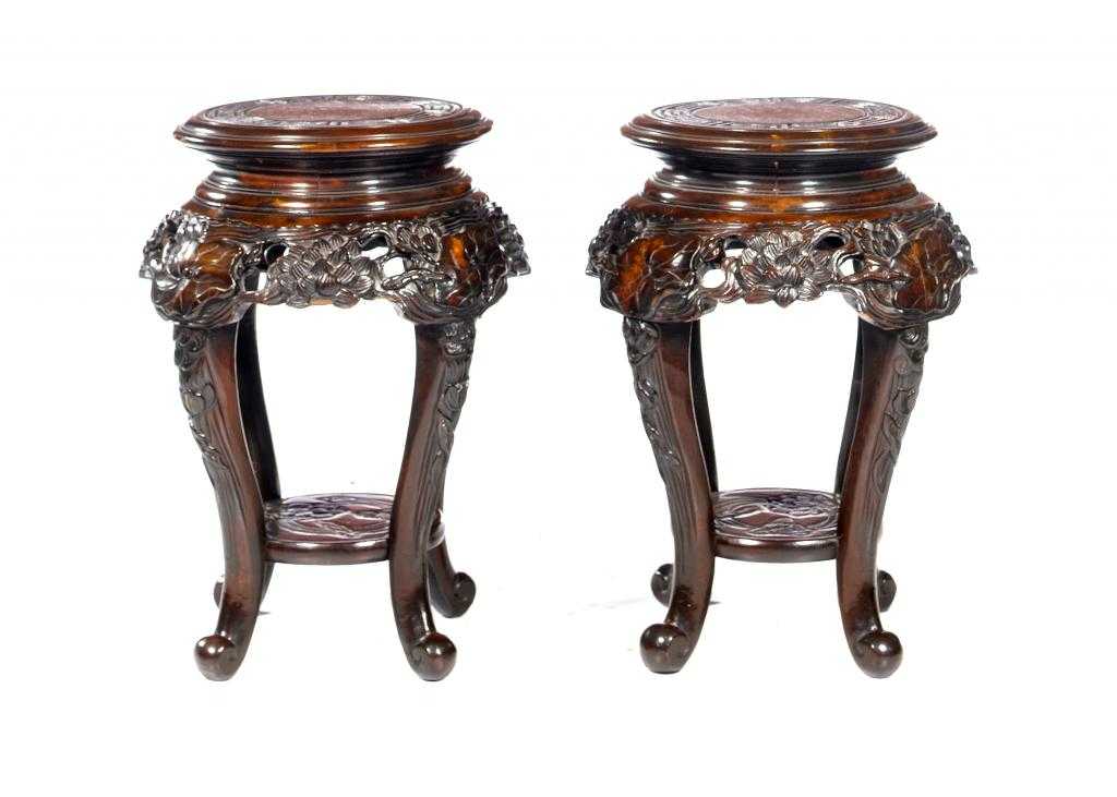 Appraisal: A PAIR OF CHINESE HARDWOOD VASE STANDS with blind fret