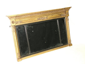 Appraisal: A Regency giltwood overmantel mirror circa the inverted breakfront moulded