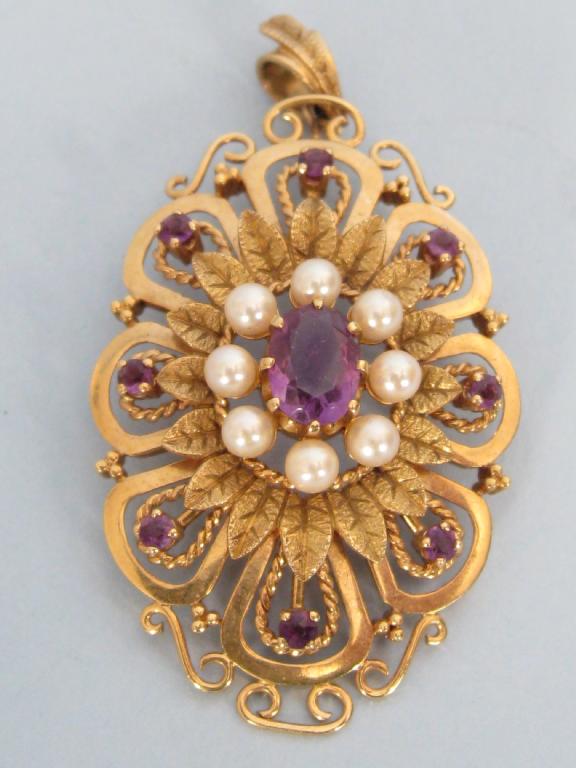 Appraisal: A Pearl and Amethyst Pendant central oval shaped amethyst claw-set