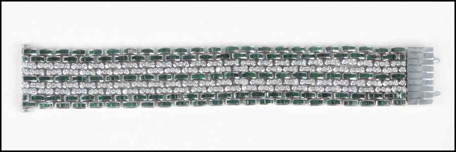 Appraisal: EMERALD DIAMOND AND KARAT WHITE GOLD BRACELET Round diamonds are