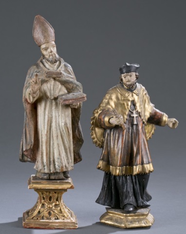 Appraisal: Two th c European Wooden Santos Figures A polychrome bishop