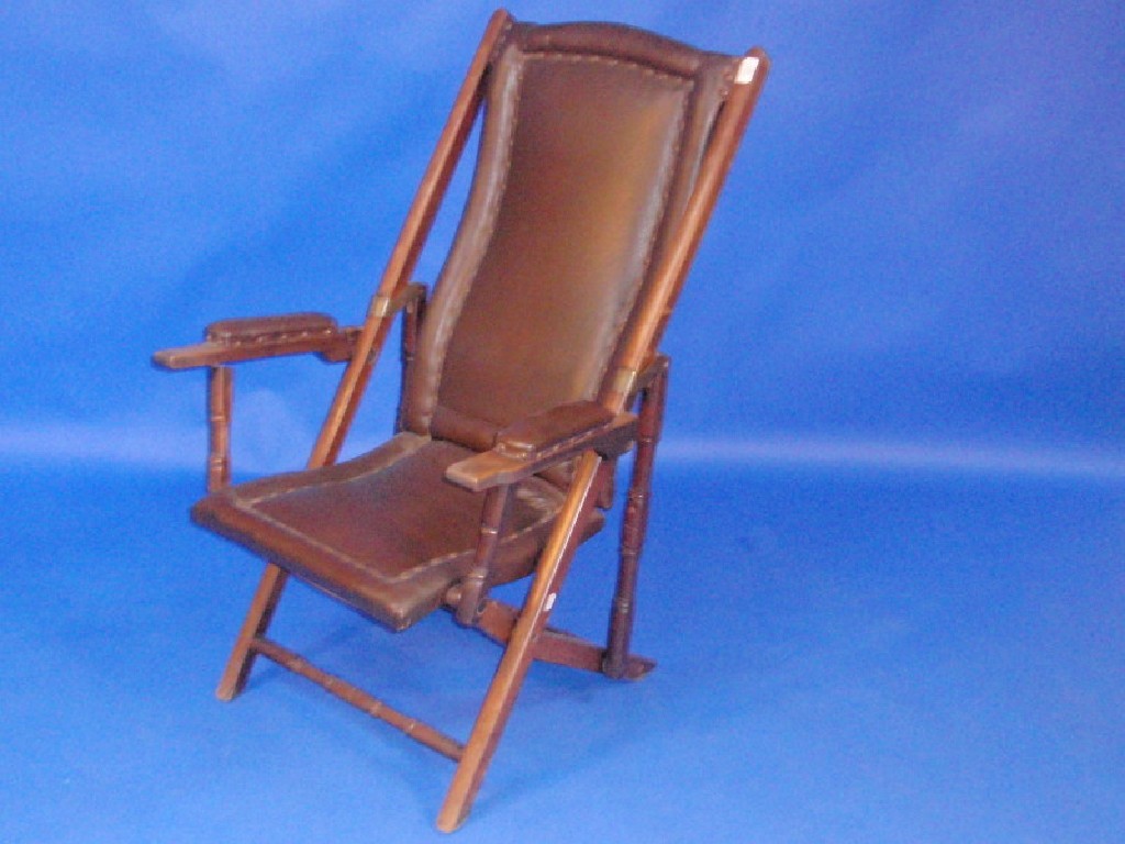 Appraisal: A teak folding schooner chair