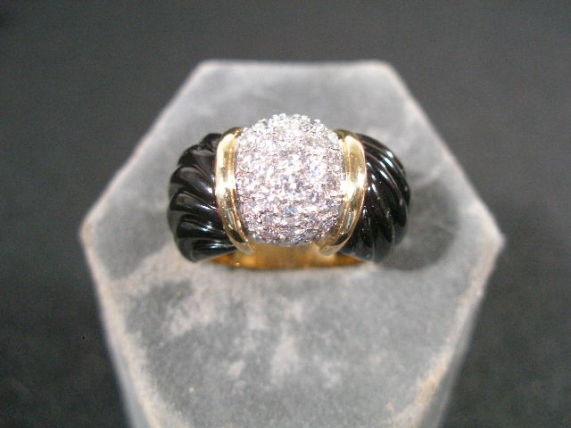 Appraisal: Ladies Ring K Yellow Gold gold stamped w central band