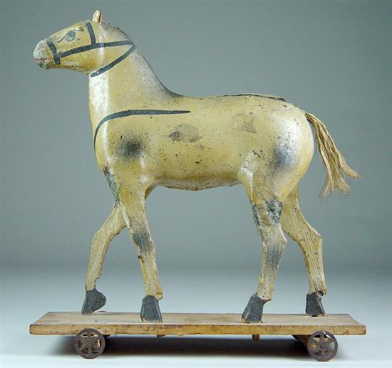 Appraisal: Horse Pull Toy One wheeled base Papier mache with string