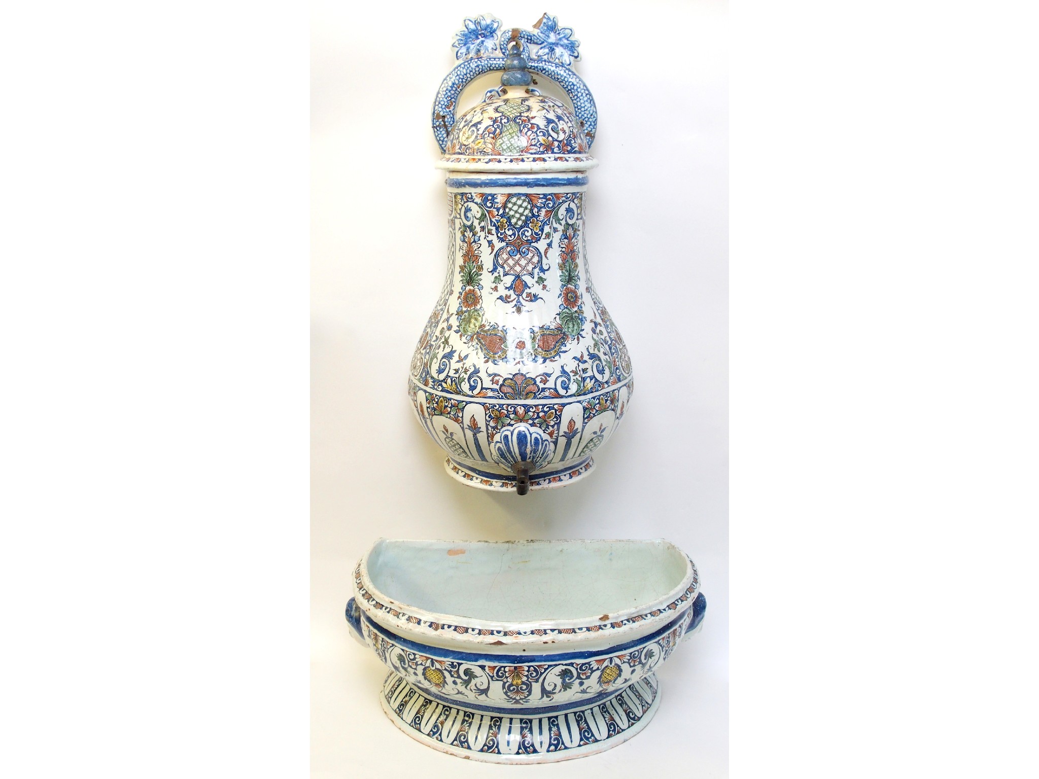 Appraisal: A French faience cistern with cover and basin th Century