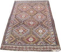 Appraisal: Antique Kazak Carpet Traditional Kazak geometric patterned carpet in an