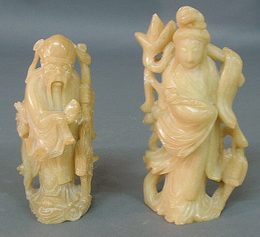 Appraisal: Two oriental carved soapstone figures h h