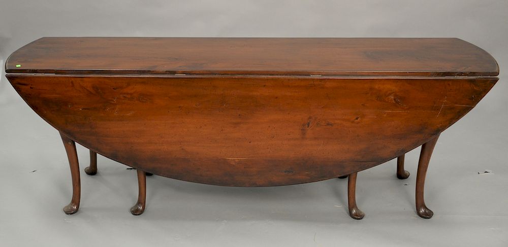 Appraisal: Queen Anne style harvest type drop leaf table Queen Anne