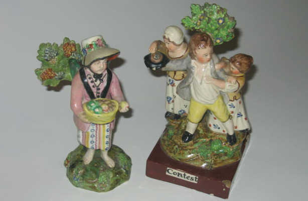 Appraisal: TWO ENGLISH TH CENTURY PRATTWARE FIGURES One titled Contest showing