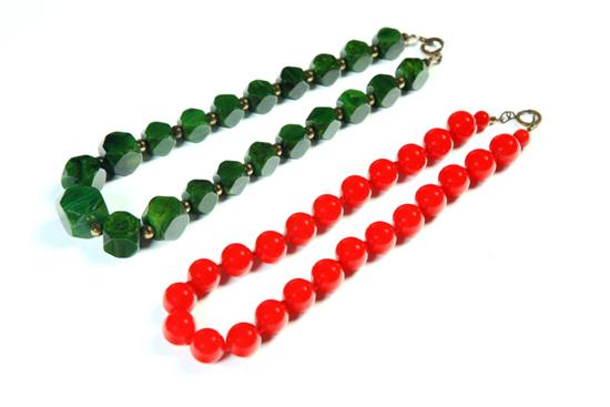 Appraisal: TWO EARLY BEAD NECKLACES American Ca - Red bakelite bead