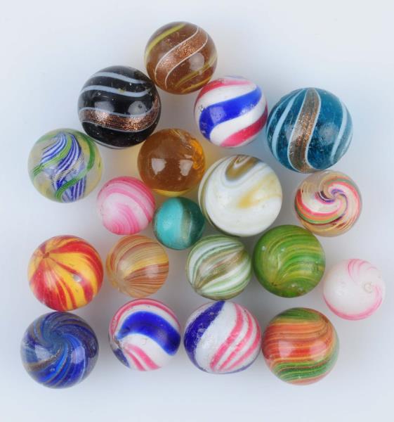 Appraisal: Lot Of Handmade Marbles Lot includes six lutz three peppermints