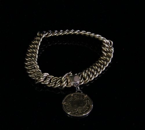 Appraisal: A Continental gold fancy-link bracelet hung with a Swiss franc