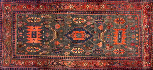 Appraisal: KURD-BIJAR Area rug with geometric pattern and Arabic writing in