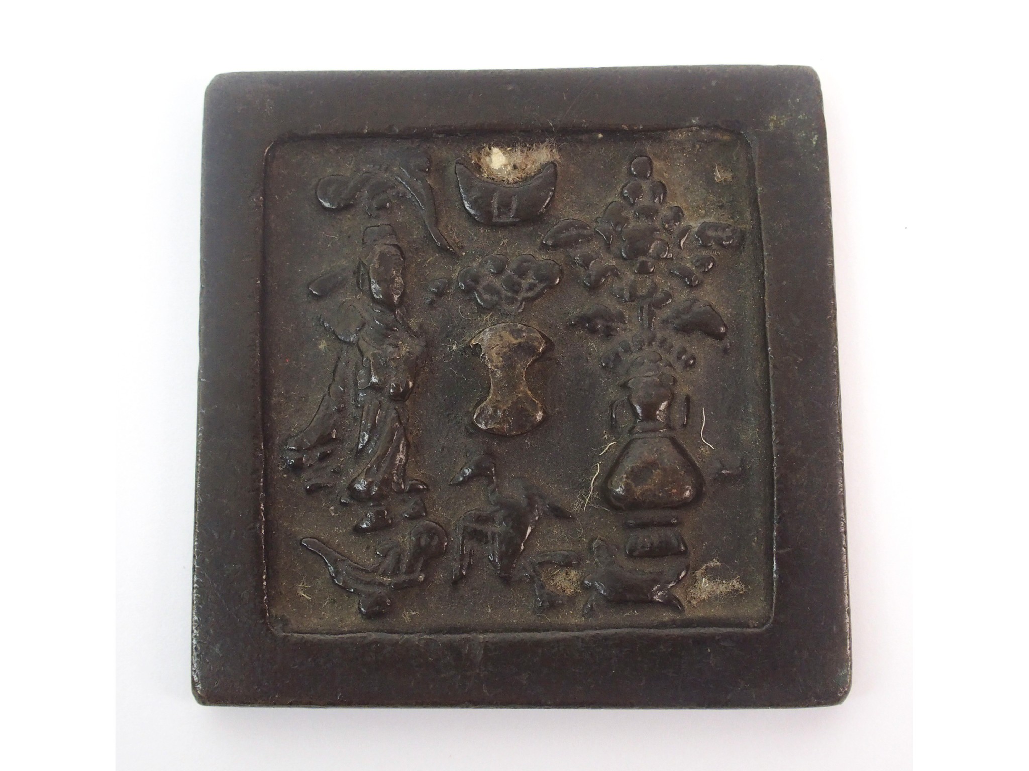 Appraisal: A Chinese bronze square hand mirrorcast with a lady animals