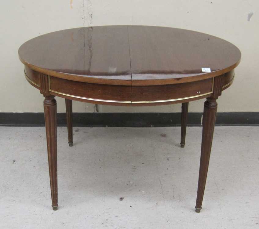 Appraisal: A ROUND LOUIS XVI STYLE MAHOGANY DINING TABLE likely Belgian