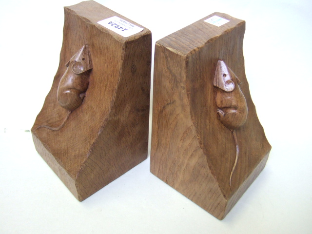 Appraisal: A pair of carved oak bookends mid th century by