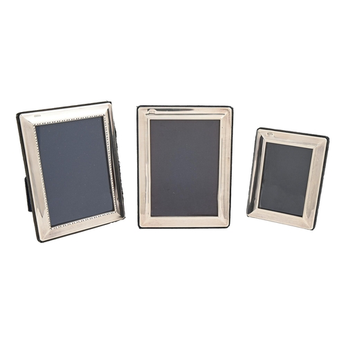 Appraisal: Three Elizabeth II silver photograph frames x cm and smaller