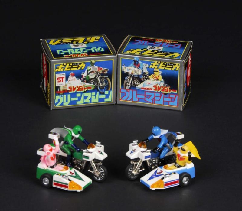 Appraisal: Popy Green Machine Blue Machine Goranger Bikes Description Japanese Made