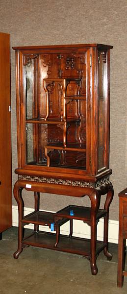 Appraisal: An export mixed wood and glass display cabinet Late Qing