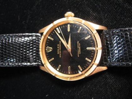 Appraisal: Gentleman's yellow gold wristwatch Rolex contemporary Oyster Perpetual movement with