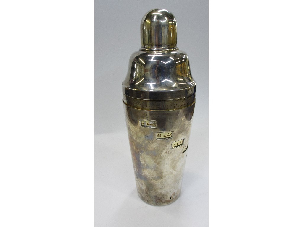 Appraisal: Silver plated cocktail shaker with revolving action showing assorted recipes