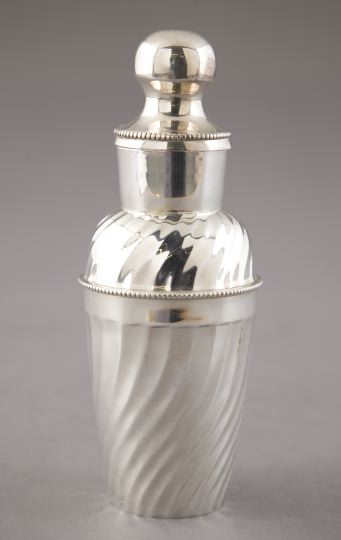 Appraisal: Neiman Marcus Silverplated Cannele Brass Cocktail Shaker the white interior