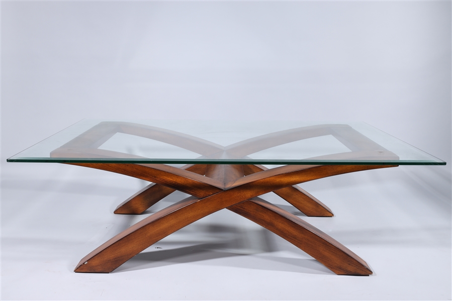 Appraisal: Coffee table with wood base and glass top with beveled